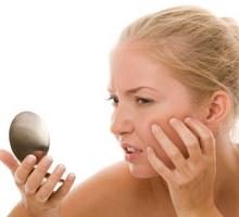 Małe pryszcze na twarzy: główne przyczyny i leczenie
